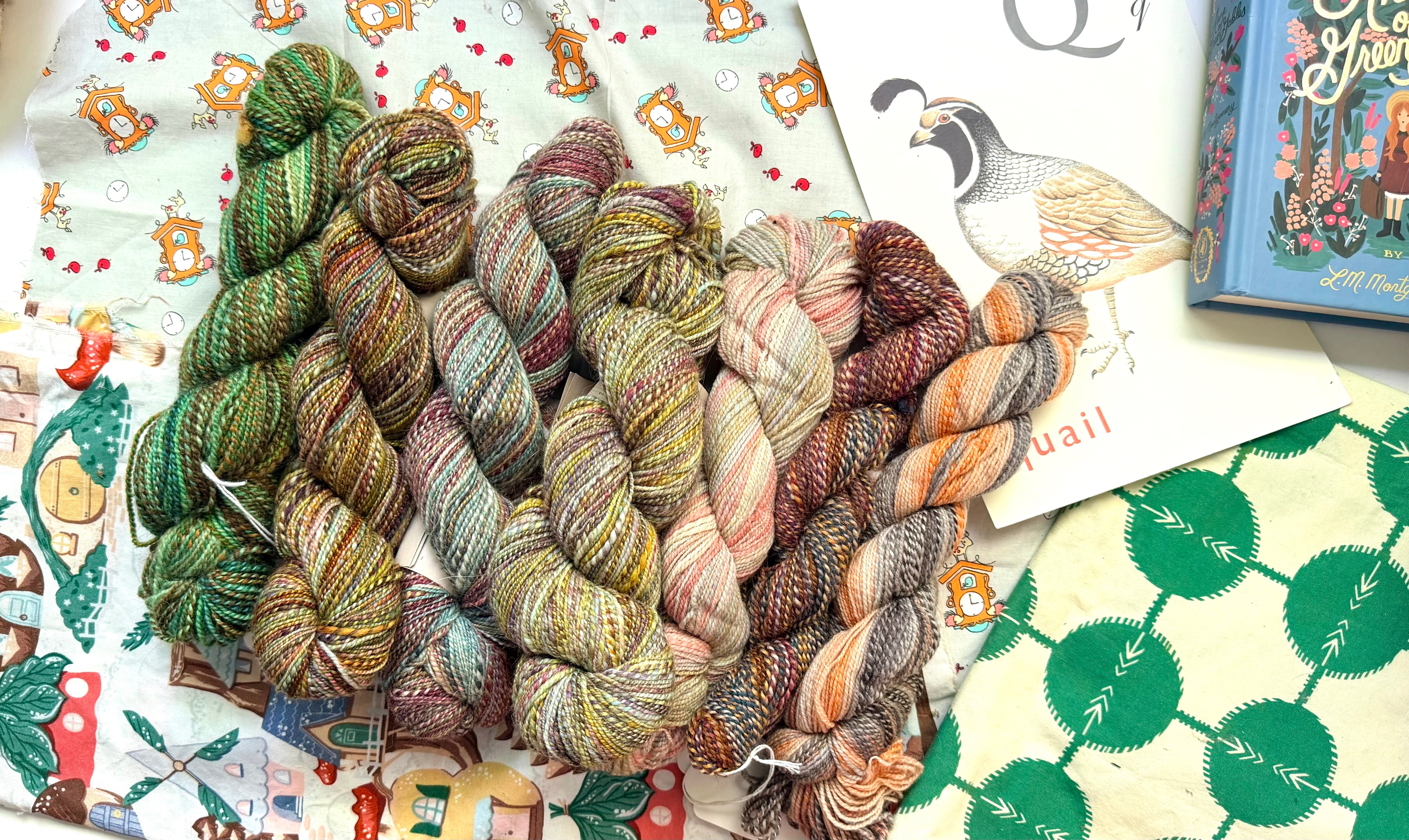 Storybook Yarn — illustrated still-life of skeins on a checkered cloth